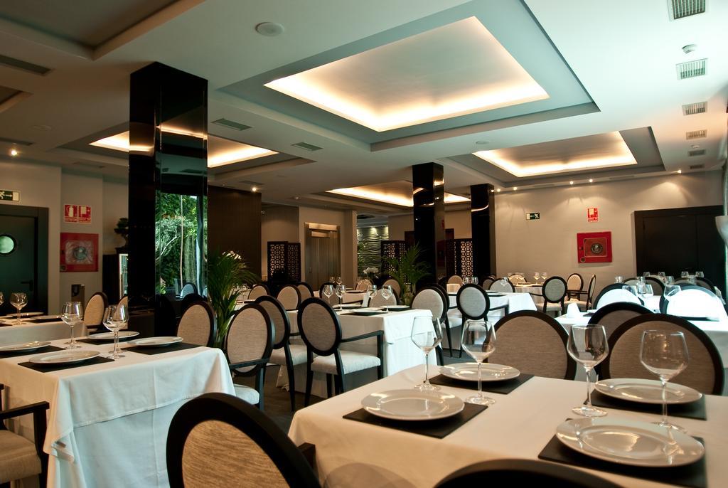 Hotel Infanta Leonor Écija Restaurang bild